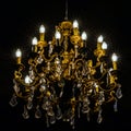 Crystal chandelier lighting in the big majestic hall Royalty Free Stock Photo