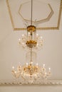 Crystal Chandelier. Vintage strass lamp. Castle interior. Castle Kacina, Empire Chateau near Kutna Hora, Bohemia, Czech Republic Royalty Free Stock Photo