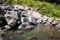 Crystal clean little creek , small waterfall scenic view in mountains.