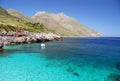 Crystal clear blue sea and mountains Royalty Free Stock Photo