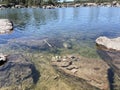 crystal clear lake in the middle of the forest Royalty Free Stock Photo