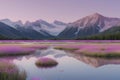 The lake reflects a pastel sky bathed in soft pinks and sapphires.