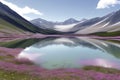 The lake reflects a pastel sky bathed in soft pinks and sapphires.