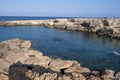 Crystal clear sea water in small rocky bay near Fig tree beach in Protaras, Cyprus Royalty Free Stock Photo
