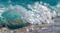 Close-up Macro Shot of a Crystal Clear Ocean Wave Breaking on a Sandy Beach Royalty Free Stock Photo