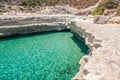 Crystal clear turquoise water in St. Peters pool - beach at Malta