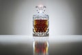 Crystal decanter with whiskey or brandy Royalty Free Stock Photo