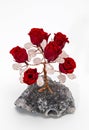 Crystal fengshui tree preserved red roses arrangement, everlasting flowers Royalty Free Stock Photo