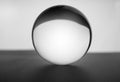 Crystal glass ball sphere transparent on grey gradient background