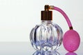 Crystal glass perfume atomiser with pink pump Royalty Free Stock Photo
