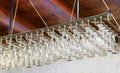 crystal glasses hanging from the ceiling of the bar Royalty Free Stock Photo