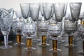 Crystal glasses lined up in rows