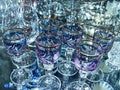 Crystal glasses for vodka, champagne and wine. Table setting. Closeup
