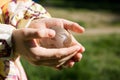 Crystal globe in children`s palms Royalty Free Stock Photo