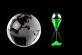 Crystal globe and green hourglass on black background Royalty Free Stock Photo