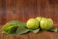 Crystal Guava fruit with leaves isolated on the wooden background Royalty Free Stock Photo