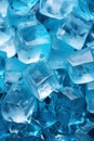 Crystal ice background for summer, pile of frozen cubes in blue light Royalty Free Stock Photo