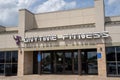 Crystal, Minnesota -Exterior of an Anytime Fitness gym and fitness center, located in a strip mall