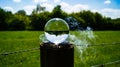 Crystal, Photo, Light, Glass Ball in bluebell wood forest showing upside down magnified image magnifying sun burning hole spot wit