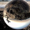 Crystal photography ball on a beach