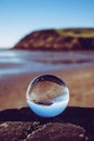 Crystal photography ball showing the seascape at St Bees Head, Whitehaven, Cumbria