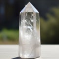 Crystal with a polished pointed hexagonal shape stands upright Royalty Free Stock Photo