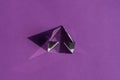 Crystal prism refracting light, magic crystals and pyramid, sphere and cube on purple background. Spiritual healing