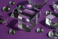 Crystal prism refracting light, magic crystals and pyramid, sphere and cube on purple background. Spiritual healing Royalty Free Stock Photo