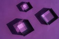 Crystal prism refracting light, magic crystals and pyramid, sphere and cube on purple background. Spiritual healing