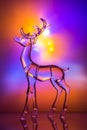 Crystal reindeer statuette in front of colorful Aurora