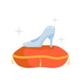 Crystal slipper on red pillow. Luxurious cushion, fabulous coronation. Glass shoes fairy tales.