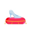 Crystal slipper on red pillow. Luxurious cushion, fabulous coronation. Glass shoes fairy tales.