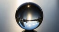 A crystal sphere rests on a Royalty Free Stock Photo