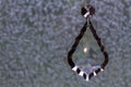 Crystal Teardrop Pendant, Hanging Against Mottled Background Royalty Free Stock Photo