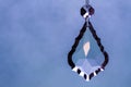 Crystal Teardrop Pendant, Hanging Against A Sky-like Background Royalty Free Stock Photo