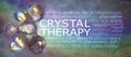 Crystal therapy word cloud on rustic rainbow background Royalty Free Stock Photo