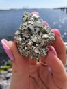 Iron Cluster Pyrite In Hand Gems Lake Stones Gems River Water Rocks Royalty Free Stock Photo