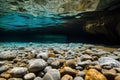 crystalclear water showcasing the rocky floor of a cave