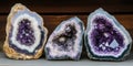 Crystalline geode stone background with amethyst and quartz mineral clusters. Royalty Free Stock Photo
