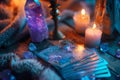 Crystals, candles and other divination tools next to the tarot cards. Generative AI Royalty Free Stock Photo