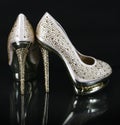 Crystals encrusted gold shoes Royalty Free Stock Photo