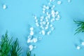 Crystals of large sea salt and dill on a blue table. Background for advertising salt. Table salty. Salted food. Royalty Free Stock Photo