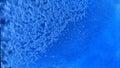 Crystals of snow and ice on the glass and blue sky in the background. Abstract frame, texture and background. Winter Royalty Free Stock Photo