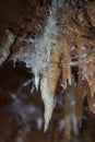Crystals on speleothemes in a cave Royalty Free Stock Photo