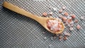 Himalaya pink salt in a wooden spoon Royalty Free Stock Photo