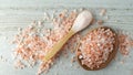 Himalaya pink salt in a wooden spoon Royalty Free Stock Photo