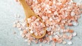 Himalaya pink salt in a wooden spoon Royalty Free Stock Photo