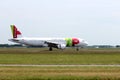 CS-TNM TAP - Air Portugal Airbus A320-214Aircraft landing at the Polderbaan 36L-18R at the Amsterdam Schiphol airport in the Nethe