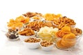 Assorted snacks in glass bowls, nuts, chips and crackers. Royalty Free Stock Photo