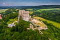 Csesznek, Hungary - Aerial drone view of the hilltop Castle of Csesznek and Csesznek city at sunset on a sunny summer afternoon Royalty Free Stock Photo